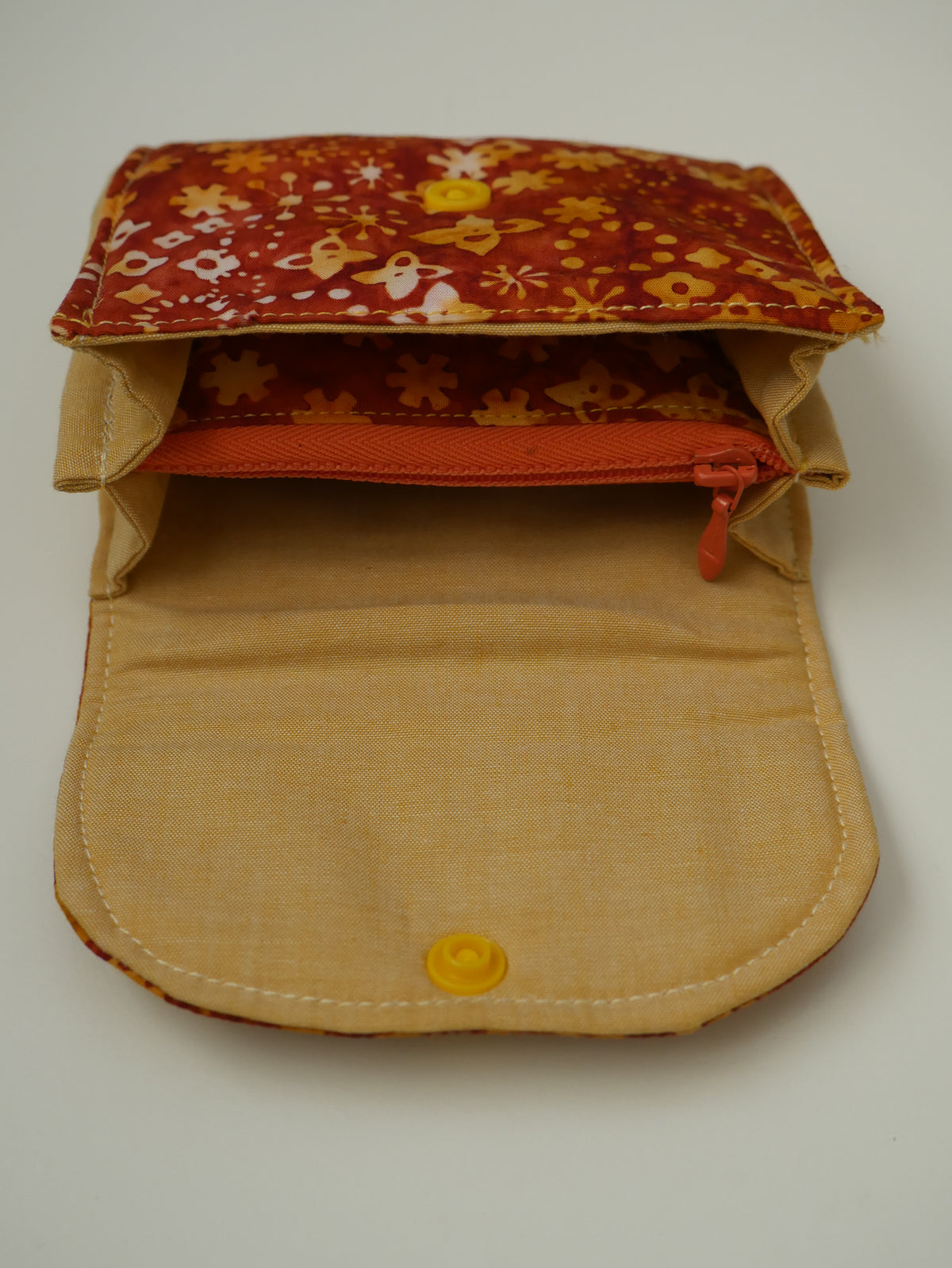 Monedero de tela · Naranja batik