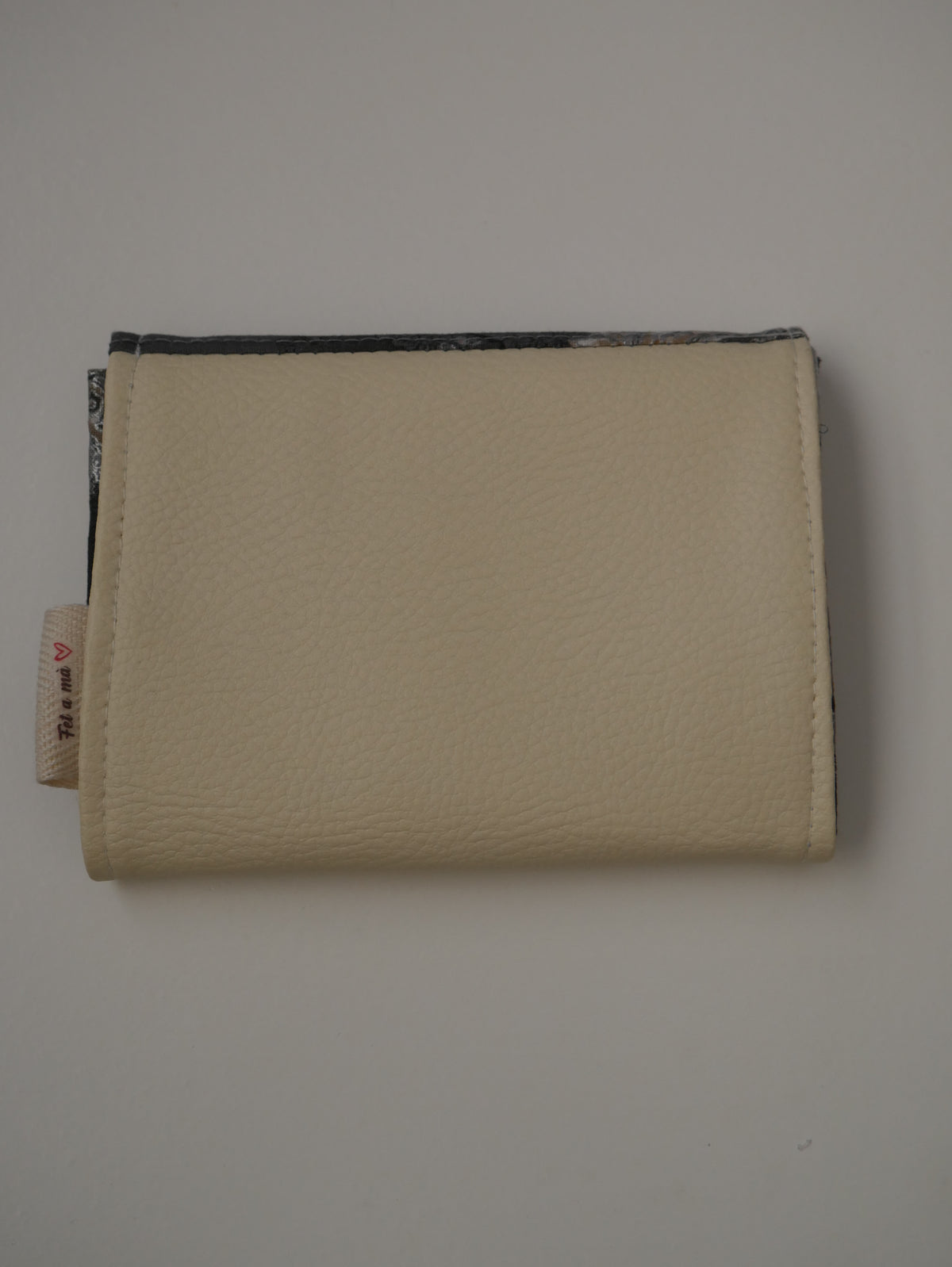 Cartera de tela · Crema i paisley gris