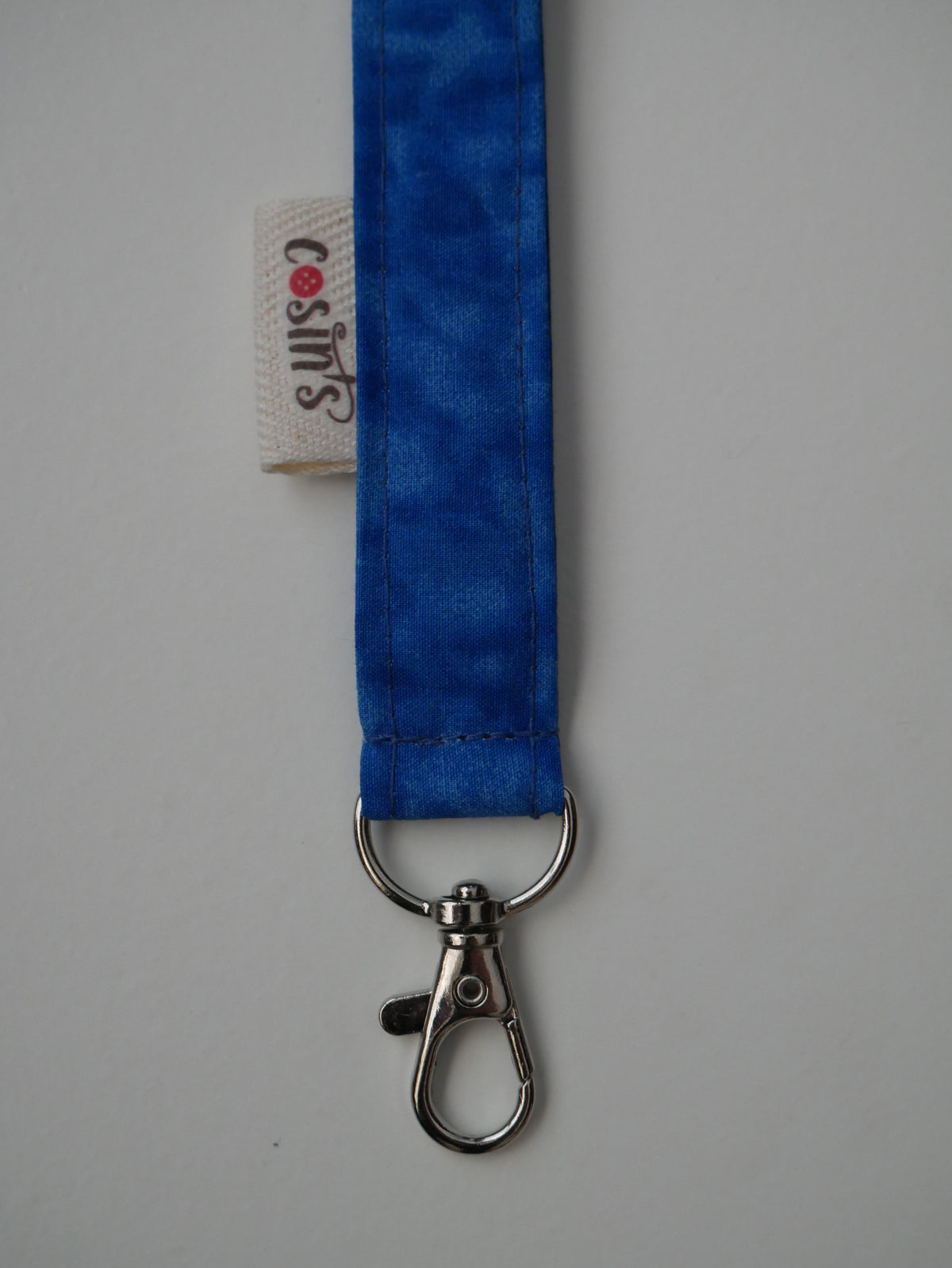 Cinta porta-claus · Blau marbrejat