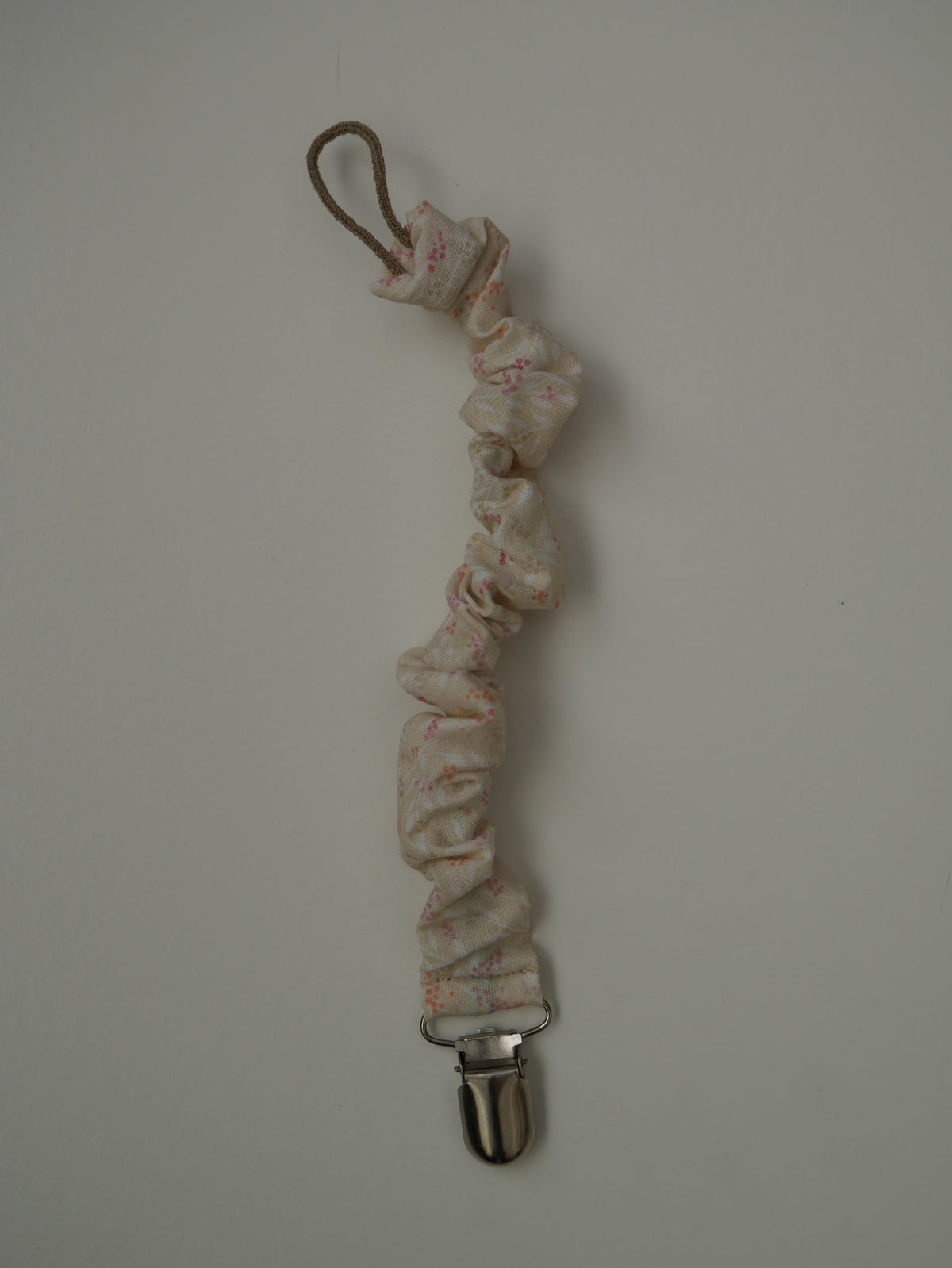 Porta-xumet · Cru amb floretes