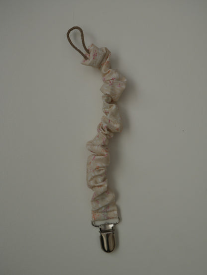Porta-xumet · Cru amb floretes