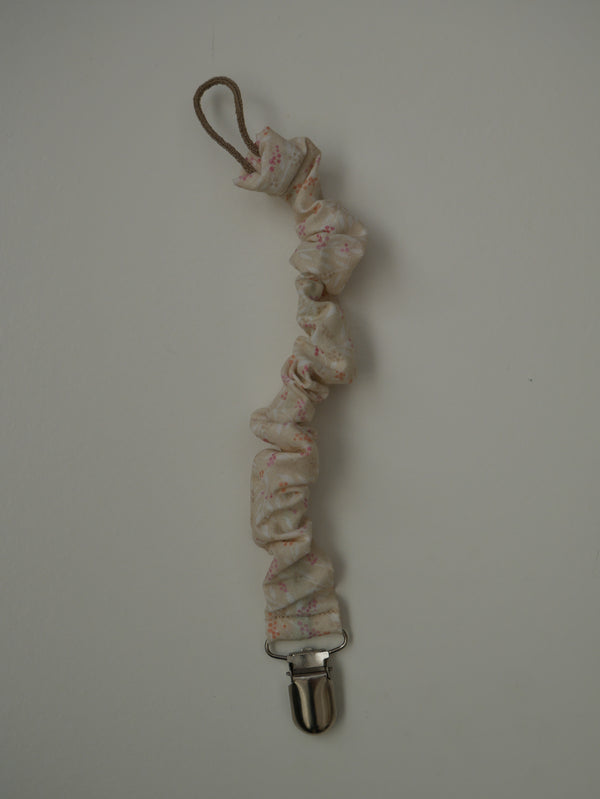 Porta-xumet · Cru amb floretes