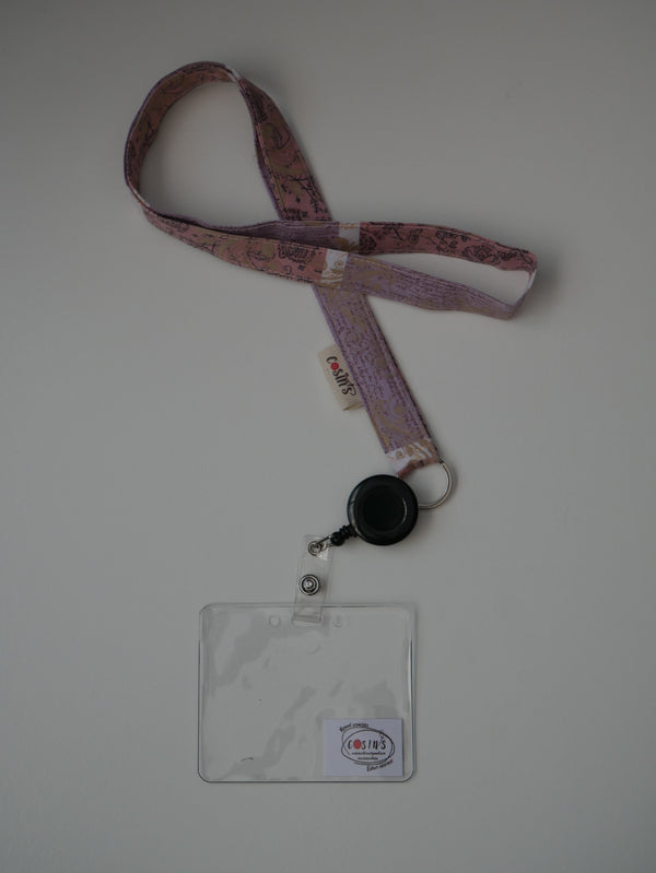 Porta-acreditació · Patchwork lila amb ocells